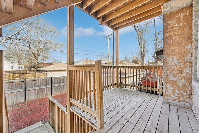 wooden deck featuring fence