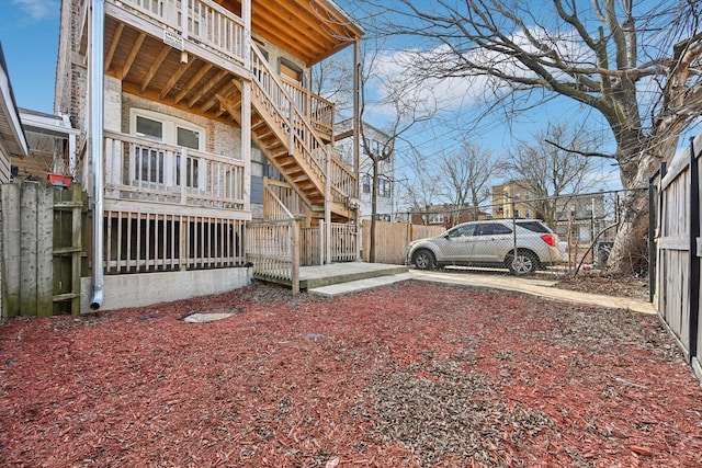 view of property exterior with fence