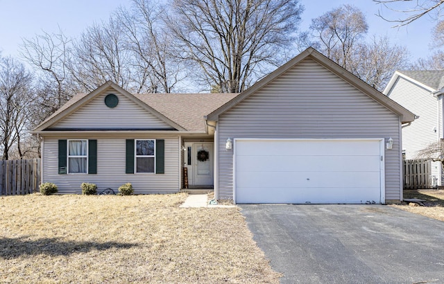 single story home with an attached garage, a shingled roof, driveway, and fence