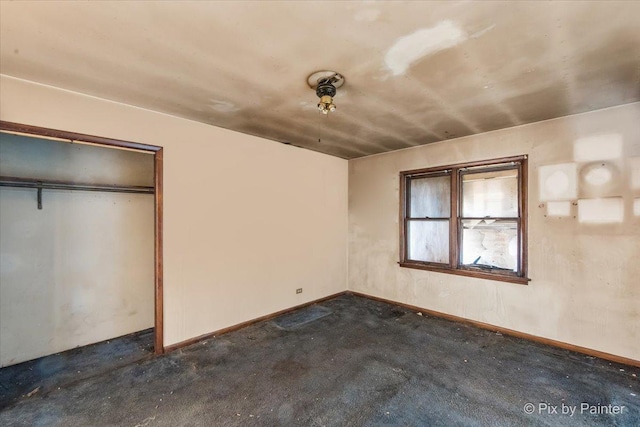 unfurnished bedroom featuring baseboards