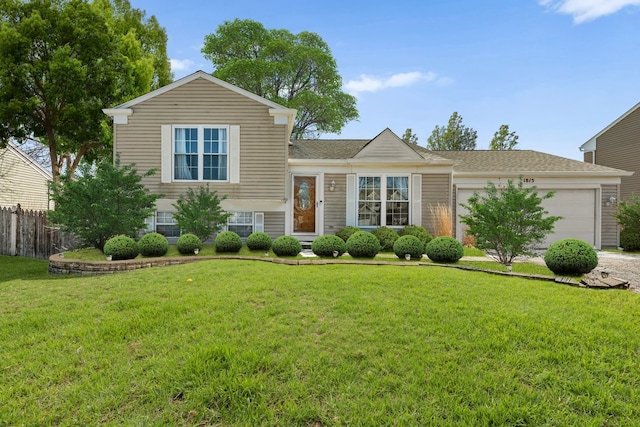 1815 College Green Dr, Elgin, IL 60123 - split level home featuring a garage and a shingled roof