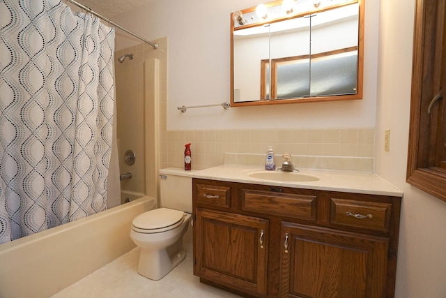 bathroom featuring vanity, toilet, and shower / tub combo with curtain