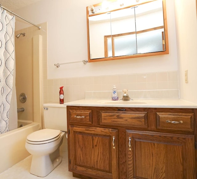 full bathroom featuring tile walls, toilet, shower / bath combo, tile patterned floors, and vanity