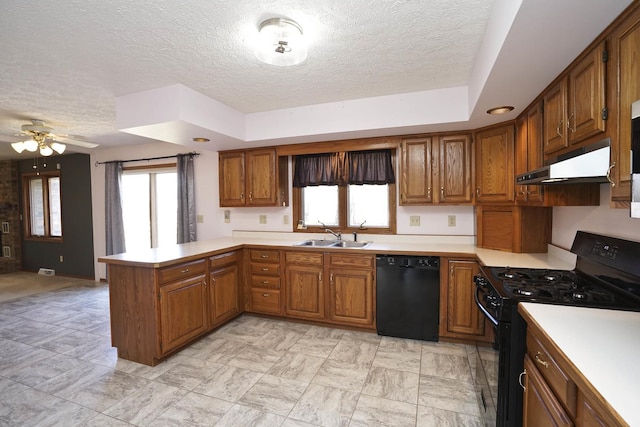 kitchen featuring black appliances, under cabinet range hood, a sink, a peninsula, and light countertops