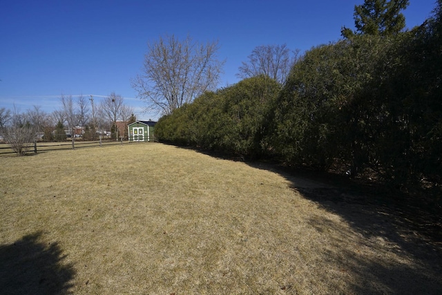 view of yard with fence