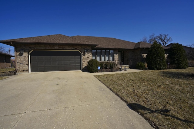 view of front facade with brick siding, an attached garage, concrete driveway, and a shingled roof