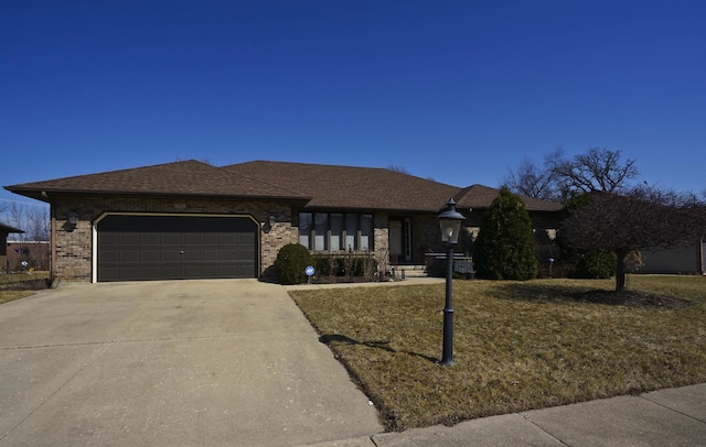 view of front of house featuring concrete driveway, an attached garage, brick siding, and roof with shingles