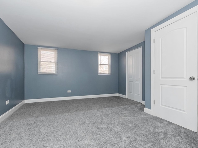 8018 S Luella Ave, Chicago, IL 60617 - unfurnished bedroom with carpet flooring, baseboards, and a closet