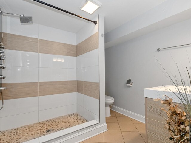 full bath featuring tiled shower