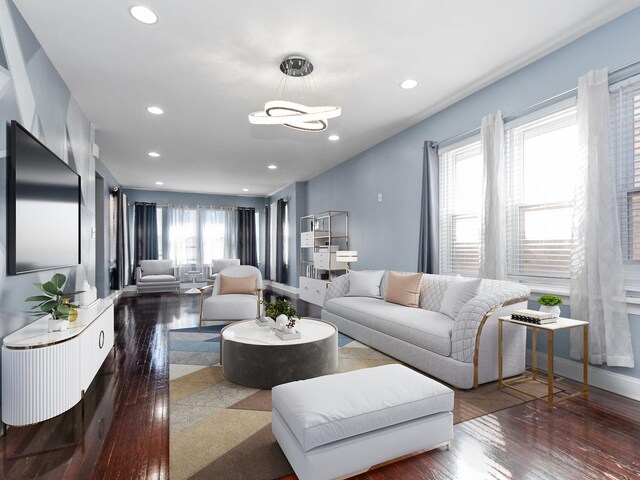 foyer with hardwood / wood-style floors and baseboards