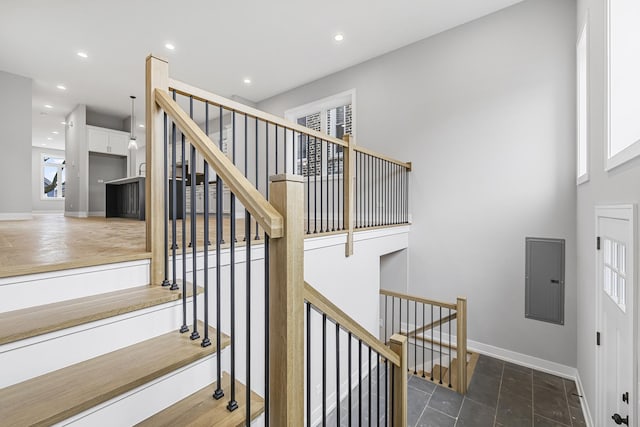 3308 S Leavitt St, Chicago, IL 60608 - stairs with baseboards, recessed lighting, and electric panel