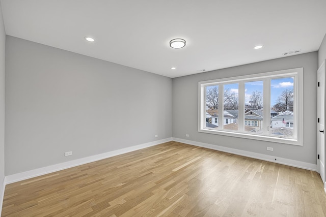 3308 S Leavitt St, Chicago, IL 60608 - unfurnished room featuring baseboards, visible vents, recessed lighting, and light wood-style floors