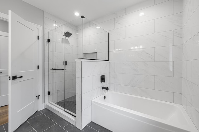 3308 S Leavitt St, Chicago, IL 60608 - bathroom featuring a washtub, tile patterned flooring, and a shower stall