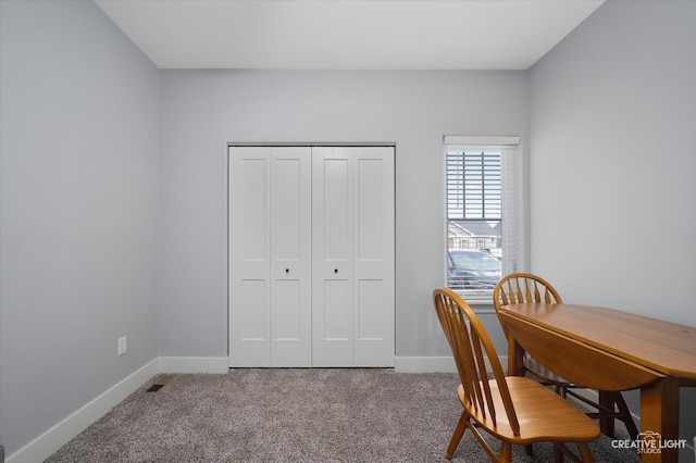 office featuring baseboards and carpet