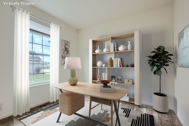 office featuring visible vents and baseboards