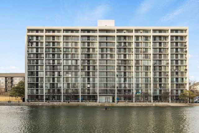 view of building exterior featuring a water view