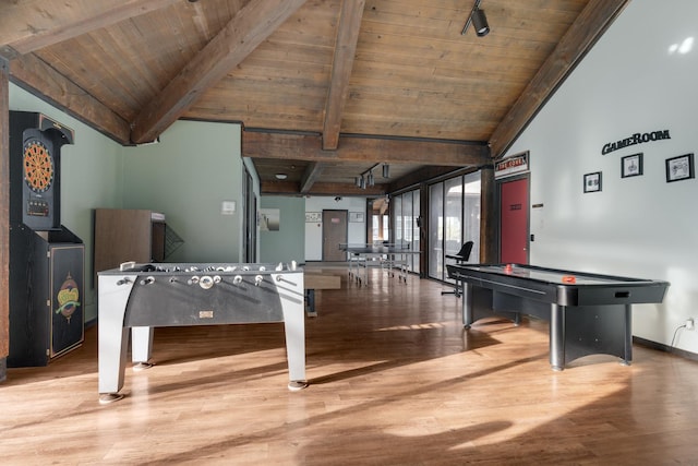 playroom featuring baseboards, beamed ceiling, wood ceiling, and wood finished floors