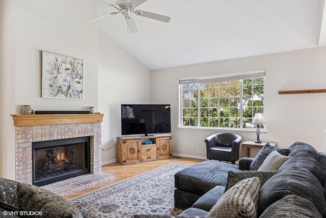 731 Norwich Ct, Crystal Lake, IL 60012 - living room with wood finished floors, a brick fireplace, baseboards, a ceiling fan, and high vaulted ceiling
