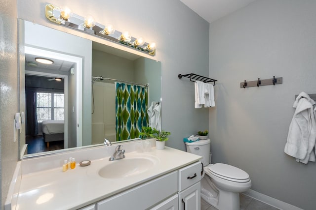 ensuite bathroom with tile patterned flooring, toilet, a shower with shower curtain, ensuite bathroom, and vanity