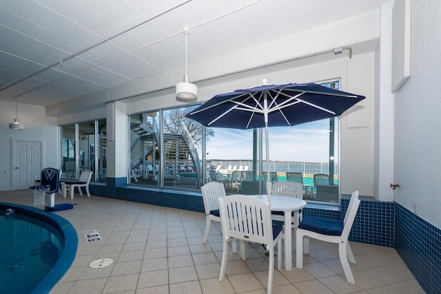 view of patio featuring outdoor dining area