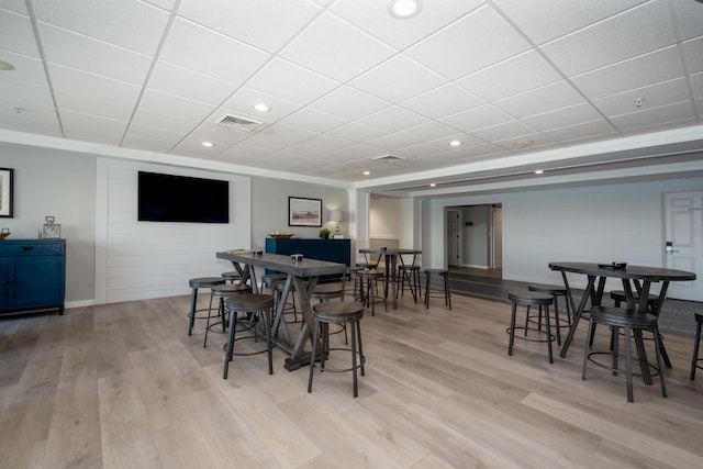 dining area featuring visible vents, recessed lighting, a paneled ceiling, and light wood-type flooring