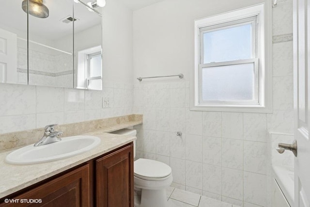 full bath with vanity, visible vents, a shower, tile walls, and toilet