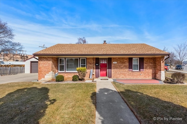 single story home with brick siding, an outdoor structure, a front lawn, and fence