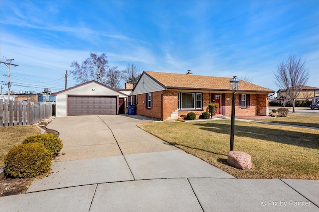 ranch-style house with an outbuilding, brick siding, a front yard, and fence