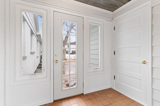 doorway featuring light tile patterned floors