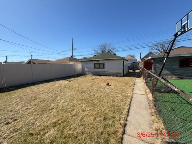 view of yard with fence