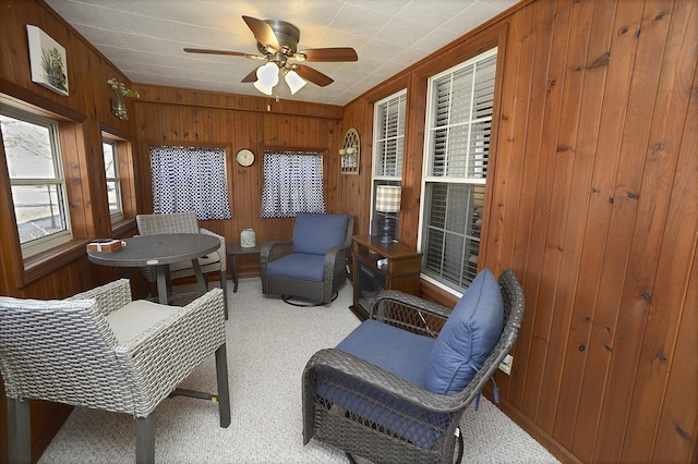 sunroom with ceiling fan