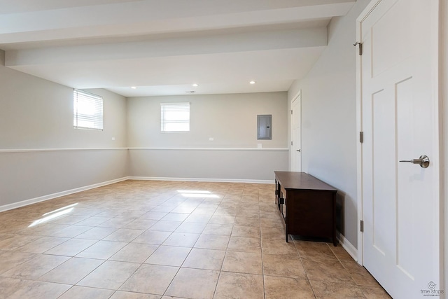 below grade area with electric panel, recessed lighting, baseboards, and light tile patterned flooring