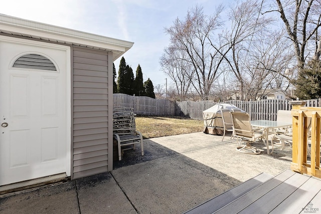 view of patio / terrace with outdoor dining space and a fenced backyard