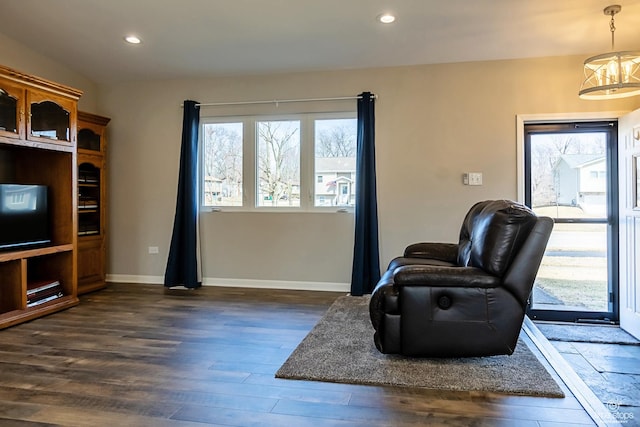 living area with recessed lighting, baseboards, and dark wood finished floors