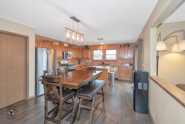 dining space featuring dark wood finished floors