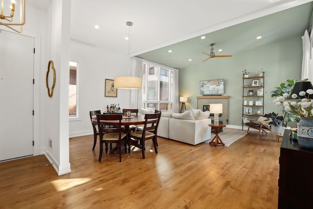 dining room with recessed lighting, light wood-style floors, and a healthy amount of sunlight