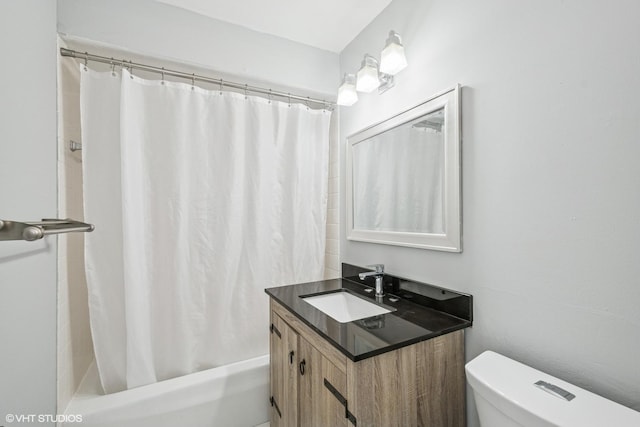 full bath featuring vanity, toilet, and shower / bath combo with shower curtain