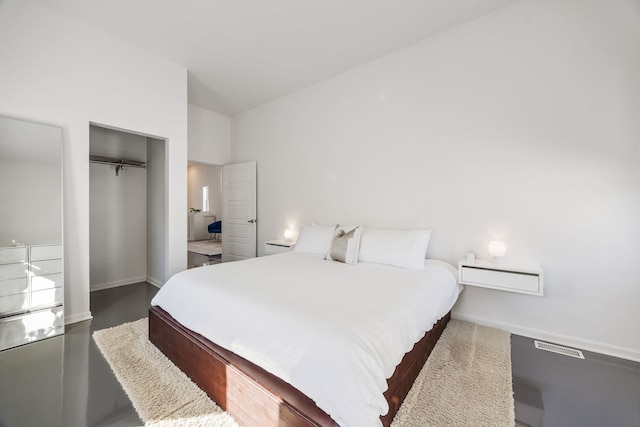 bedroom featuring a closet and baseboards