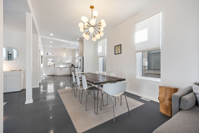 dining area with recessed lighting, visible vents, baseboards, and an inviting chandelier