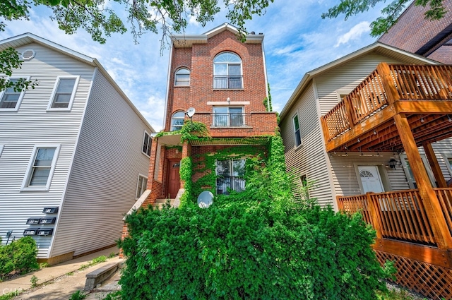 exterior space featuring brick siding