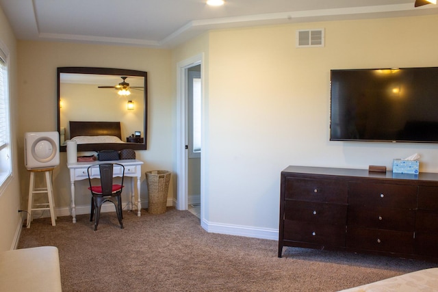 bedroom with visible vents, carpet flooring, crown molding, and baseboards