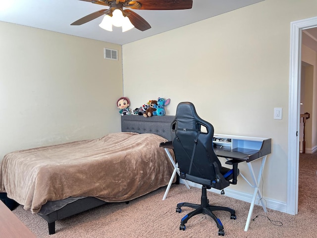 bedroom with visible vents, baseboards, carpet, and ceiling fan