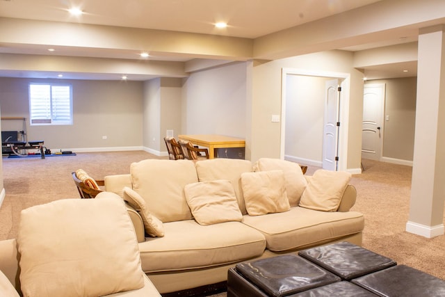 living room featuring recessed lighting, baseboards, and carpet
