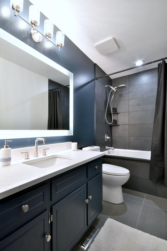 full bath with visible vents, toilet, shower / tub combo with curtain, tile patterned floors, and vanity