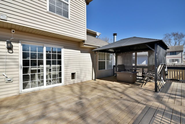 wooden deck featuring a gazebo