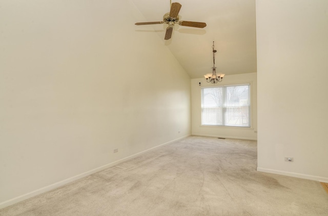 unfurnished room featuring baseboards, light carpet, high vaulted ceiling, and ceiling fan with notable chandelier