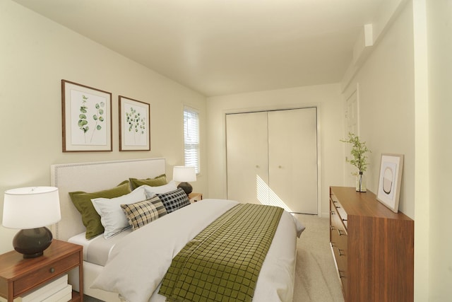 bedroom featuring a closet and light carpet