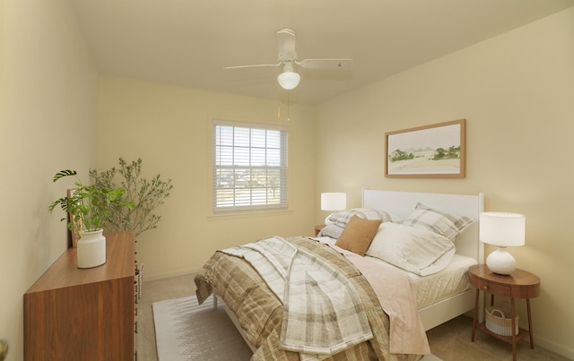 bedroom featuring carpet flooring, a ceiling fan, and baseboards