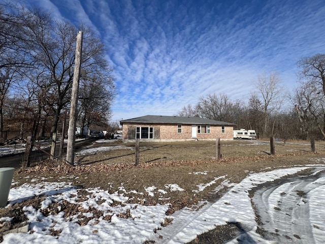 view of front of property featuring brick siding