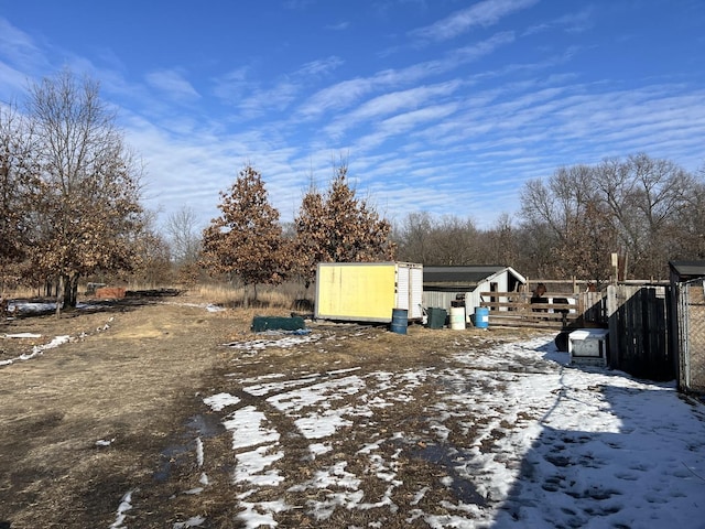 view of yard layered in snow